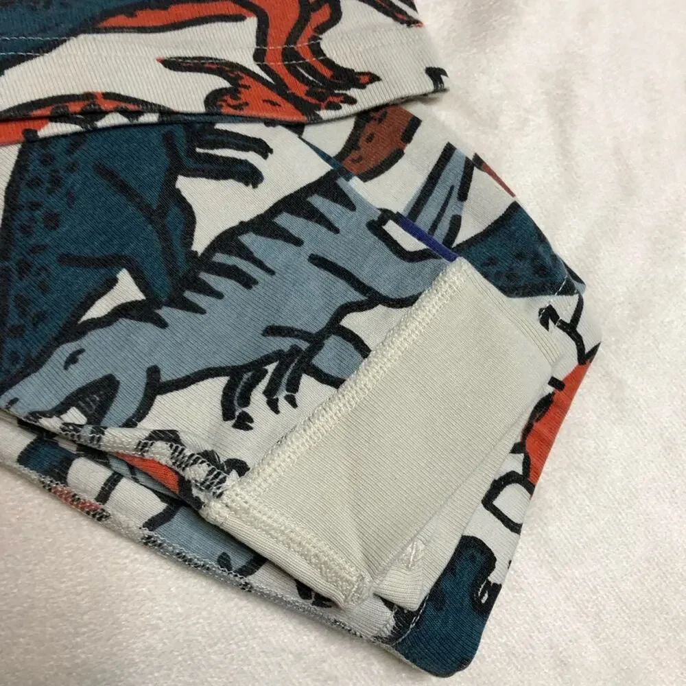 Hanna Andersson off white multicolor dinosaur pajamas size 140 or US 10